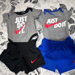 2 newborn Nike sets